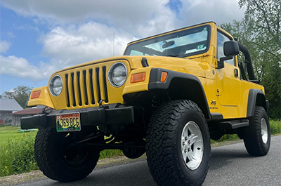 Yellow Jeep Wrangler Grill